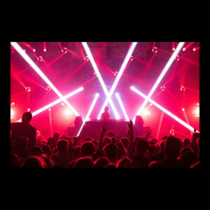 A high-energy scene from a modern club or concert, featuring a large audience with hands in the air, a DJ on stage, and powerful red and white light beams, symbolizing the evolution of contemporary nightlife and entertainment.